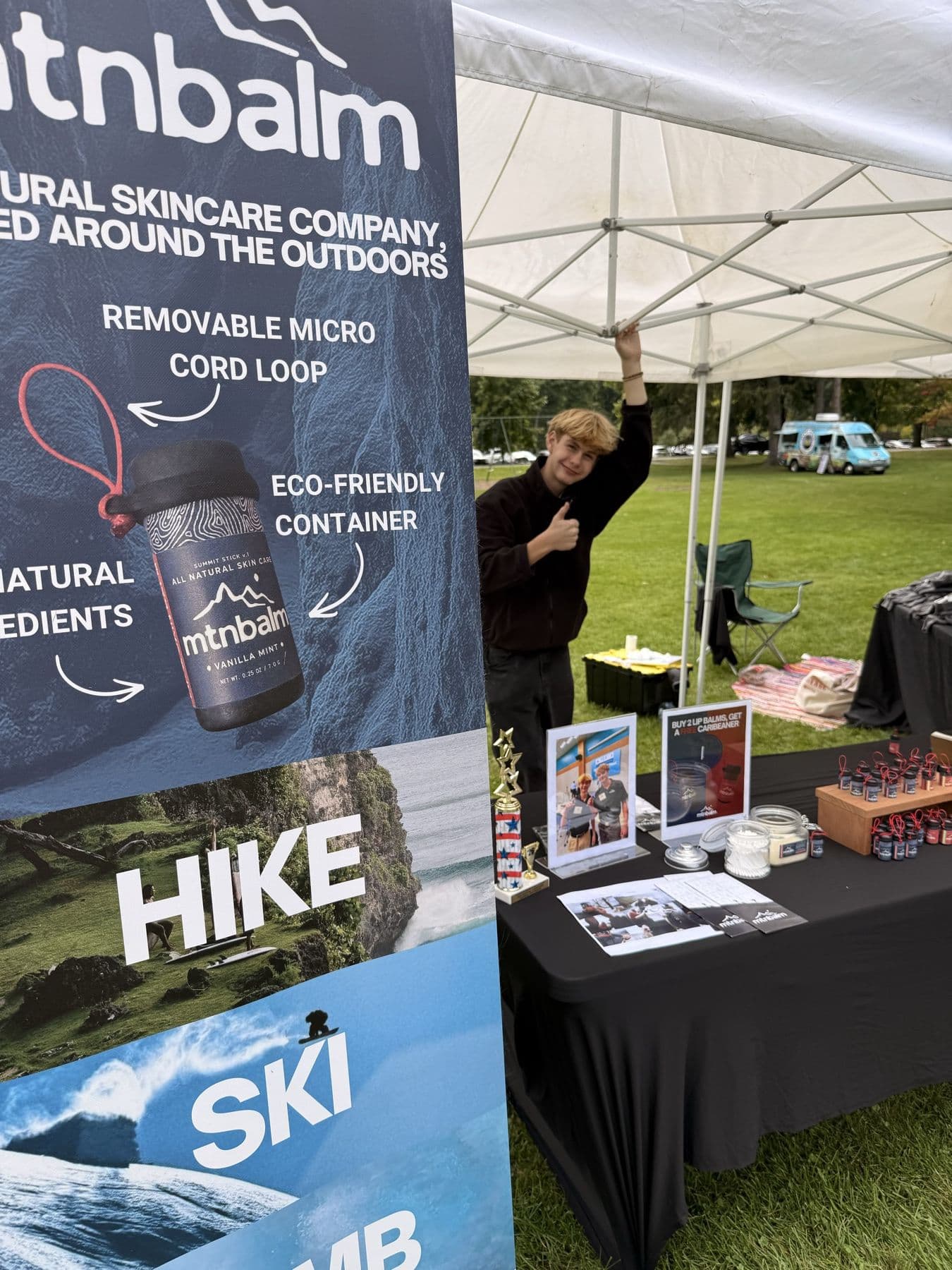 The MtnBalm booth and banner at the fall Yoga Fest
